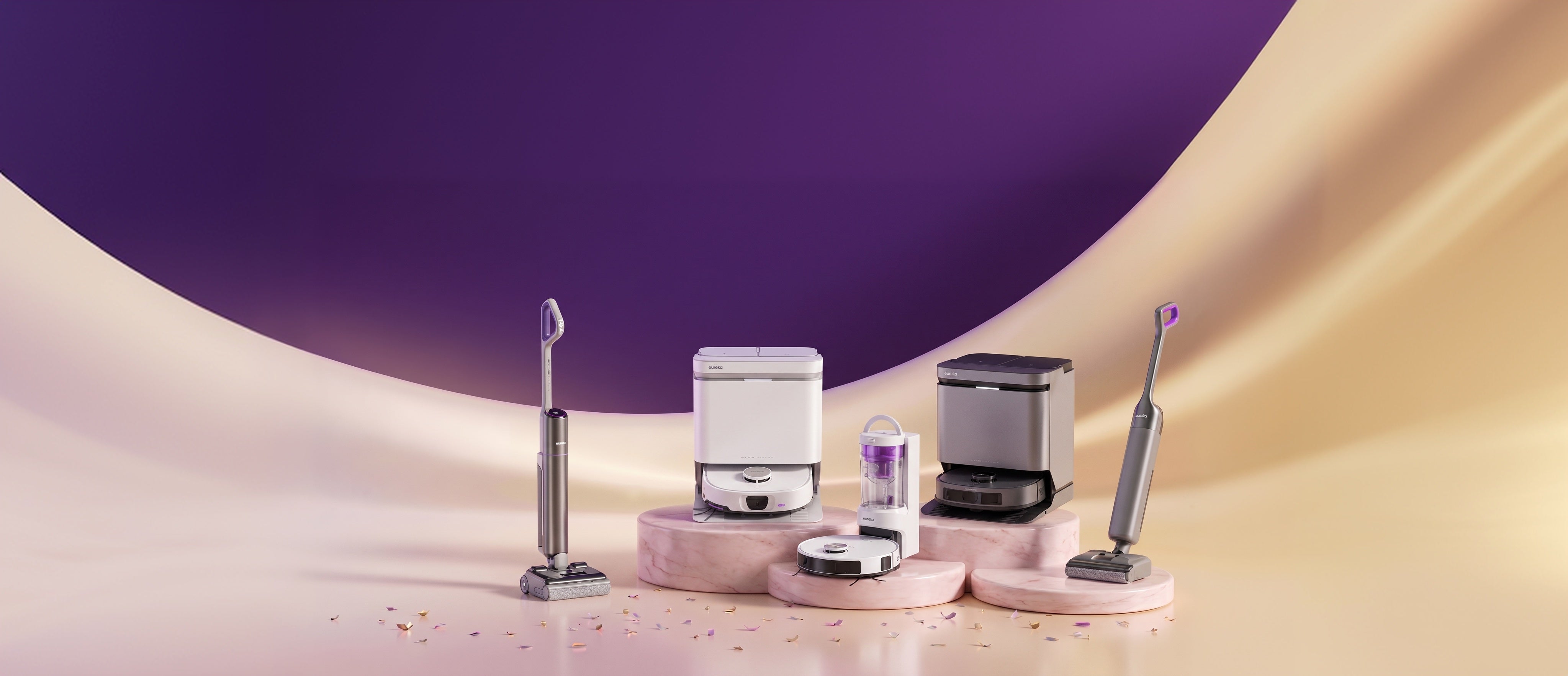 Eureka robot vacuums and cordless stick vacuums on marble pedestals